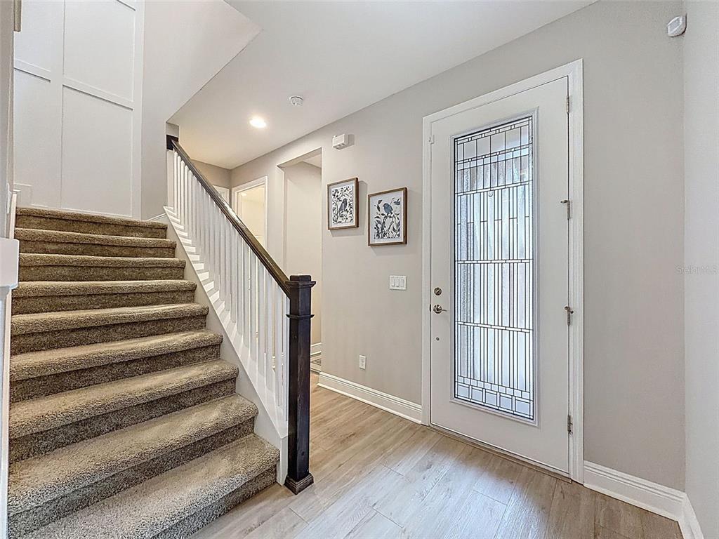 4312 Burdick Loop Odessa, FL 33556 - Photo 22 of 55 a view of entryway with wooden floor