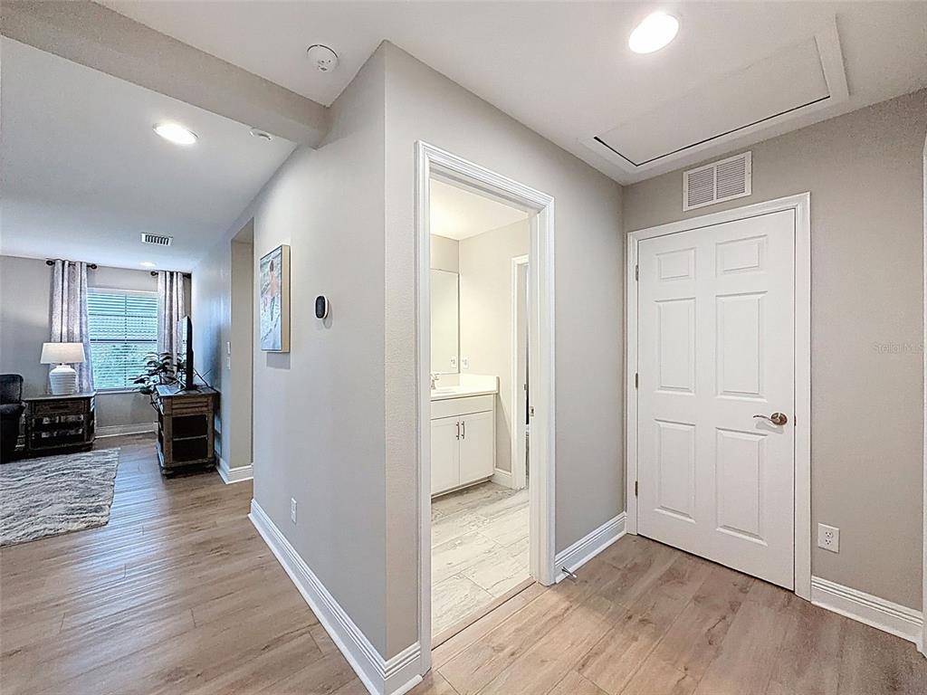4312 Burdick Loop Odessa, FL 33556 - Photo 30 of 55 a view of a livingroom with wooden floor and furniture