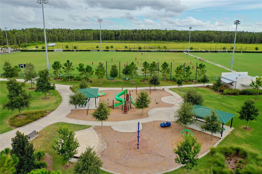 4312 Burdick Loop Odessa, FL 33556 - Photo 49 of 55 a view of a lake with a yard and green space