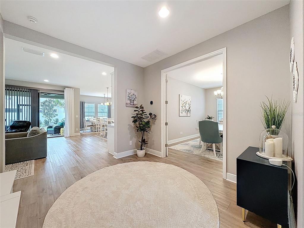 4312 Burdick Loop Odessa, FL 33556 - Photo 5 of 55 a living room with furniture and view of living room