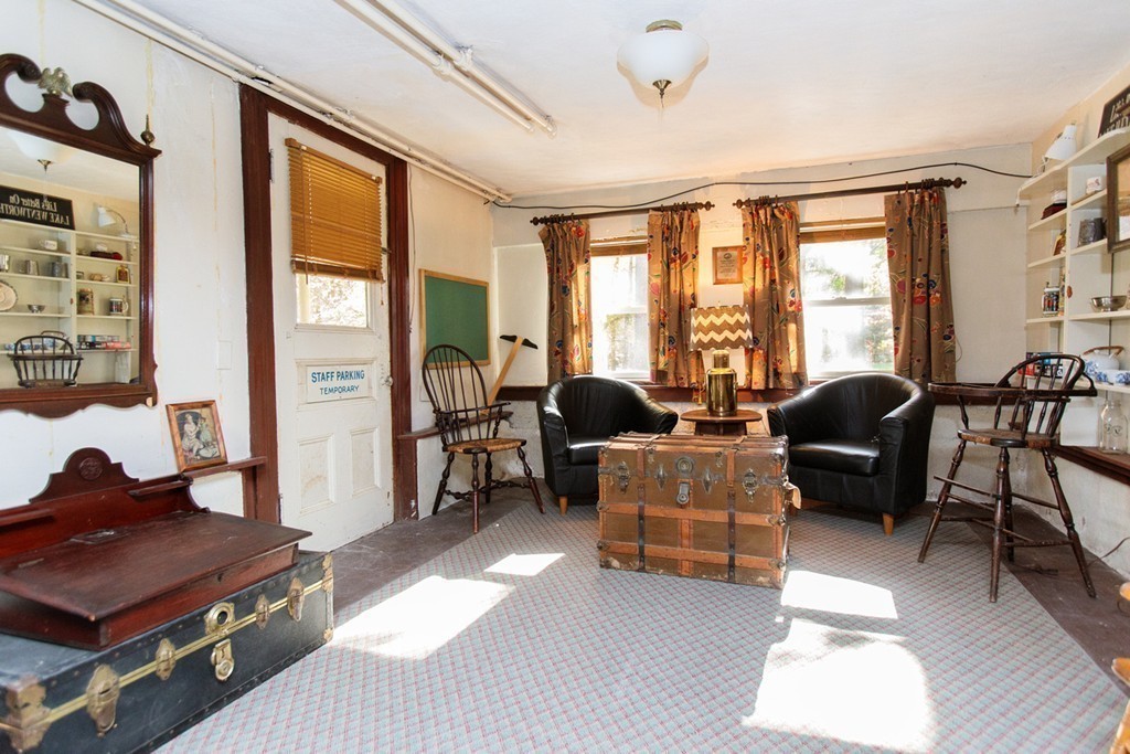 25 Longmeadow Road Wellesley, MA 02482 - Photo 21 of 24 a living room with furniture and a large window