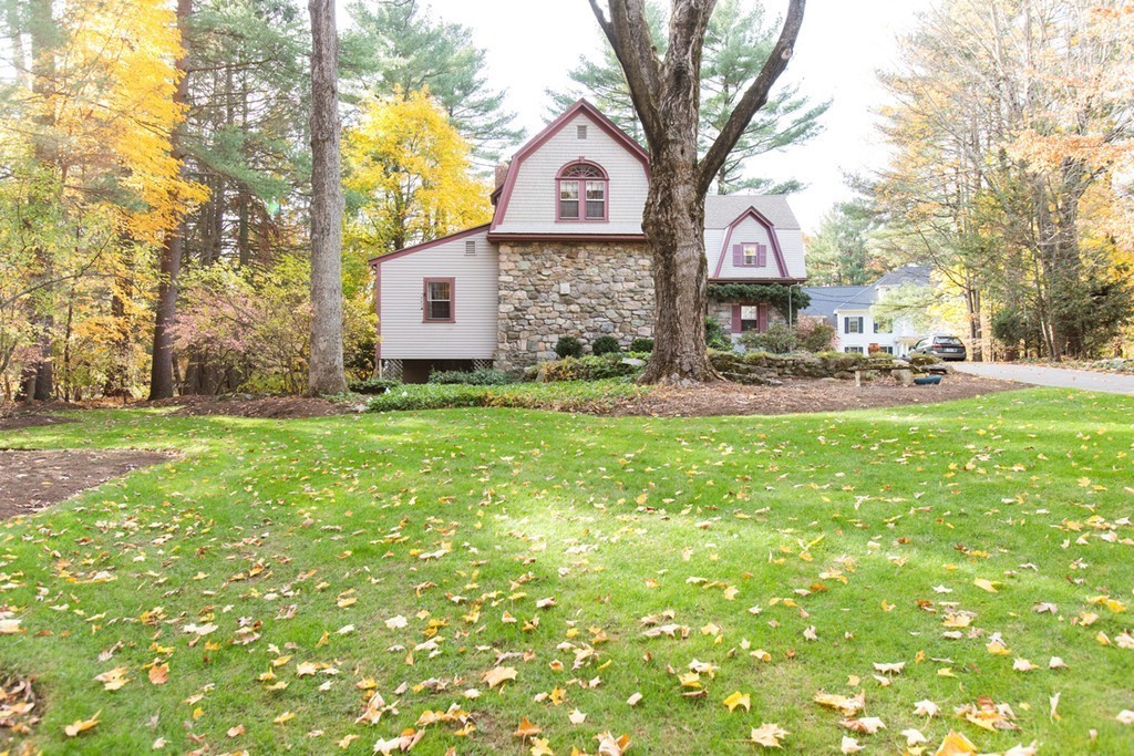 25 Longmeadow Road Wellesley, MA 02482 - Photo 23 of 24 a front view of a house with garden