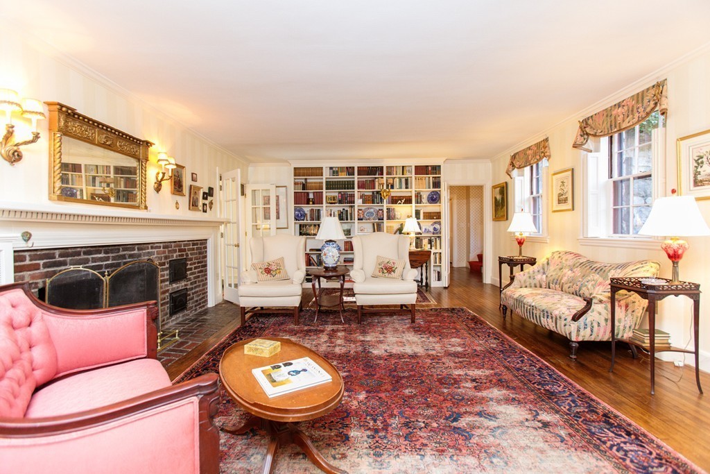 25 Longmeadow Road Wellesley, MA 02482 - Photo 7 of 24 a living room with furniture a rug and a fireplace