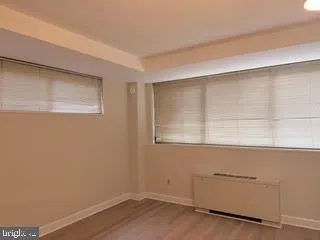 a view of a room that has a window in it