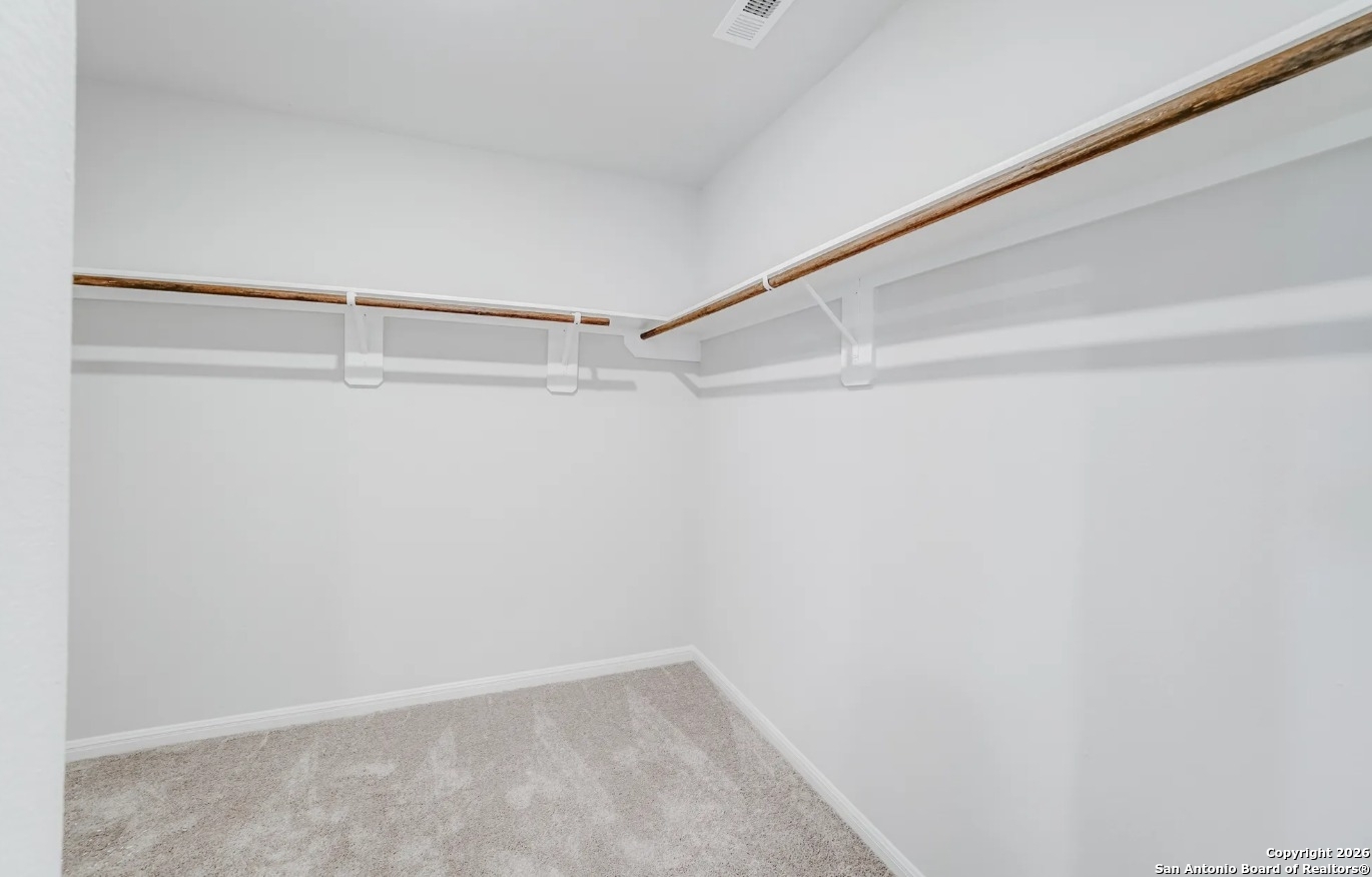 113 Sutton Place Uvalde, TX 78801 - Photo 6 of 6 a view of an empty walk in closet