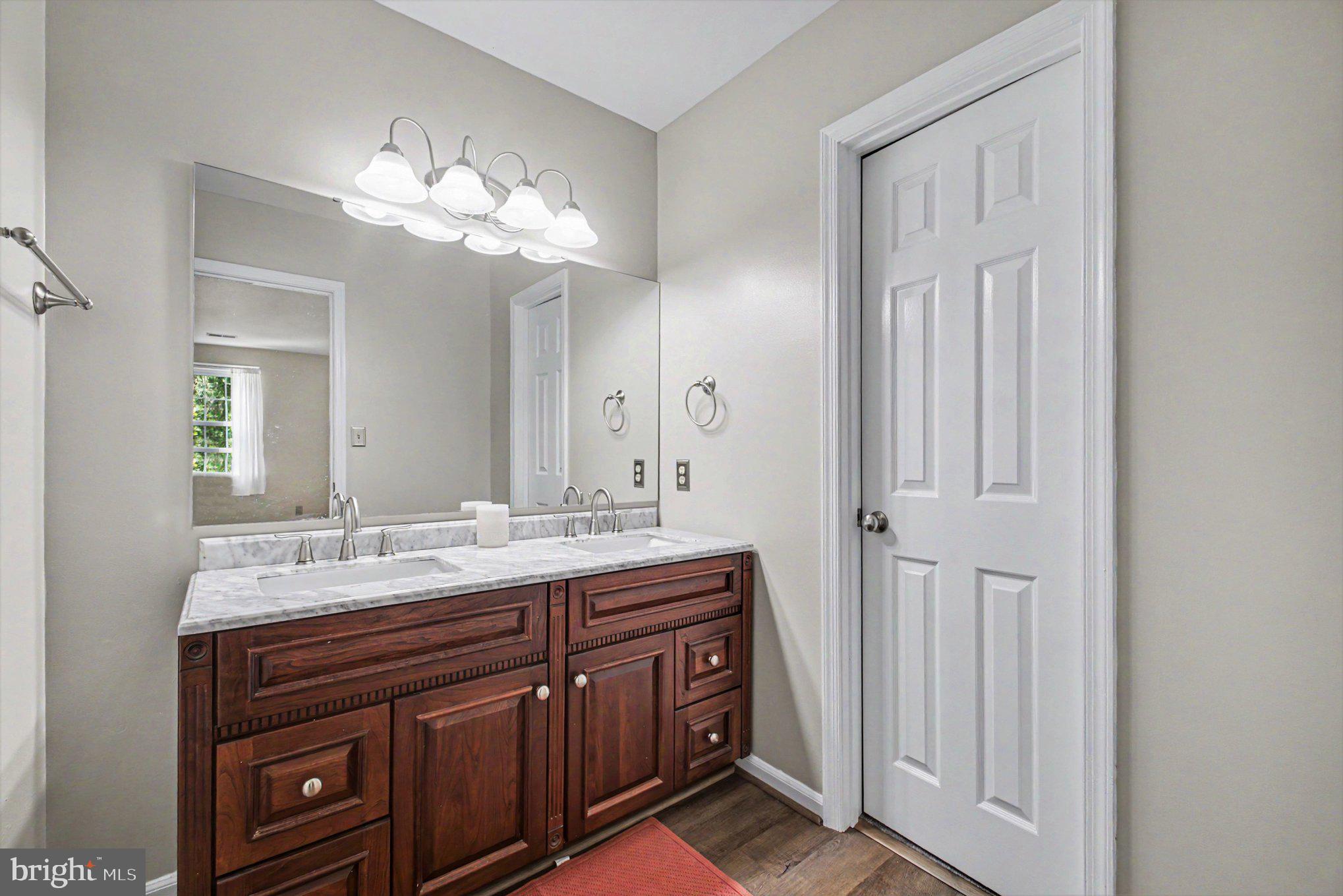 7981 Northumberland Road Springfield, VA 22153 - Photo 9 of 26 Elegant bathroom with modern finishes.