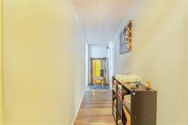 a bathroom with a toilet and a shower curtain