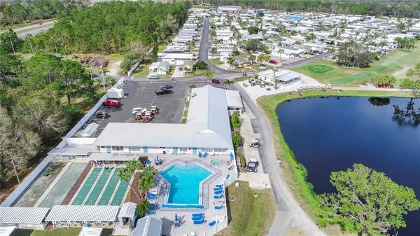 a view of a lake with a big yard