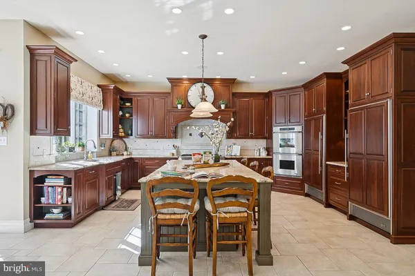 a bed room with furniture and a flat screen tv