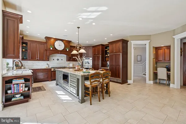 a spacious bathroom with a tub sink shower and mirror