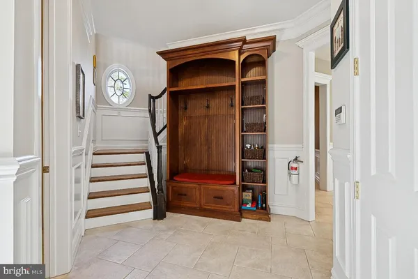 a spacious bedroom with a bed and a window
