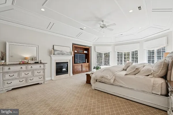 a bathroom with a sink and mirror with toilet