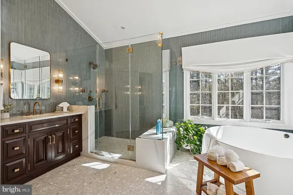 a bathroom with a shower sink double and mirror