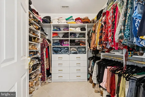 a room with furniture and a flat screen tv