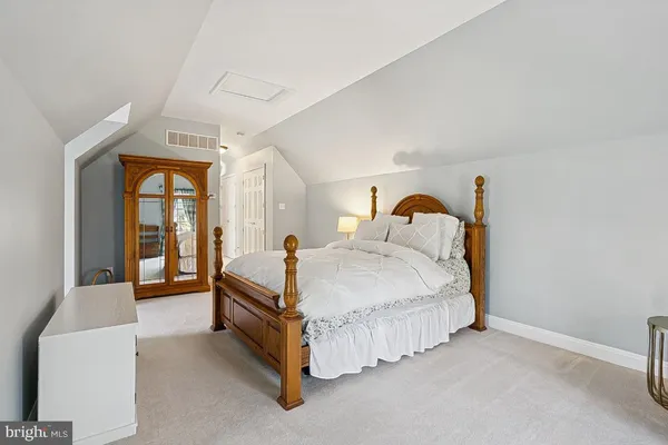 a view of a patio with a table and chairs