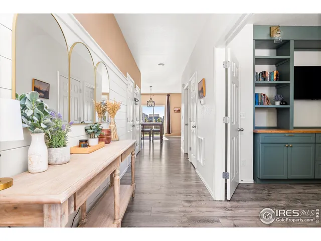 a view of a kitchen and an entryway