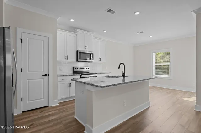 $393,900 | 69 Umbrella Palm Drive, Hampstead, NC 28443