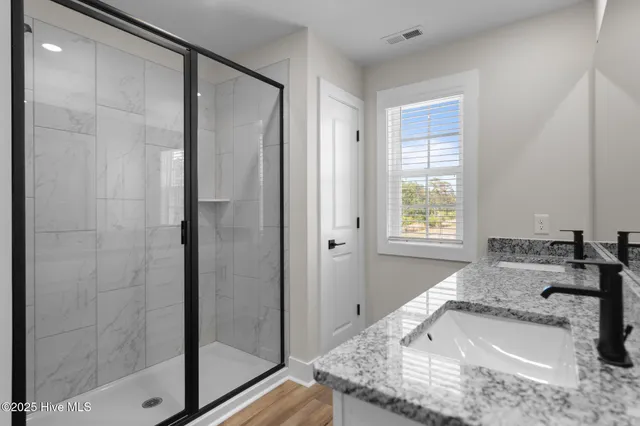 $393,900 | 69 Umbrella Palm Drive, Hampstead, NC 28443