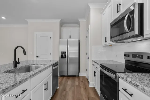 $393,900 | 69 Umbrella Palm Drive, Hampstead, NC 28443