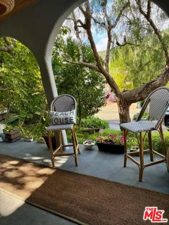 a view of outdoor space with seating area