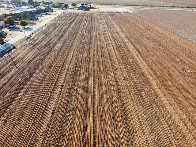 a view of outdoor space with wooden floor and yard