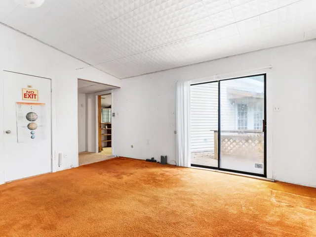 a room with furniture and a chandelier