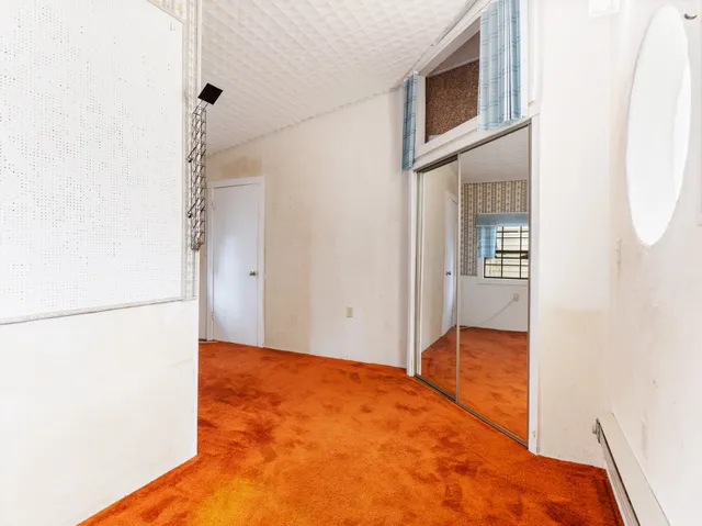 a kitchen with stainless steel appliances granite countertop wooden cabinets stove top oven a sink and dishwasher