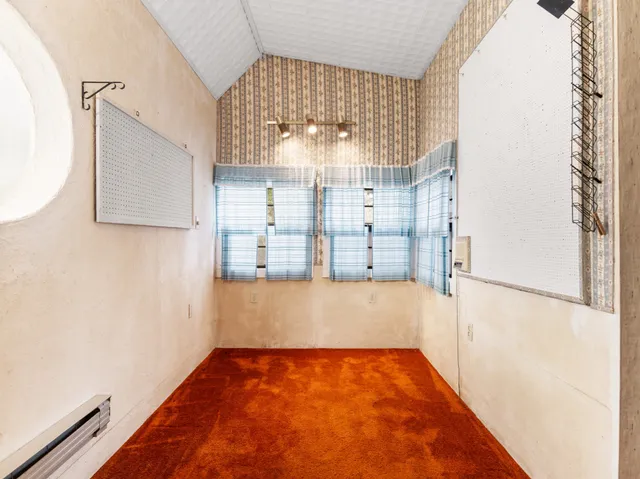 a kitchen with stainless steel appliances granite countertop a stove and a microwave