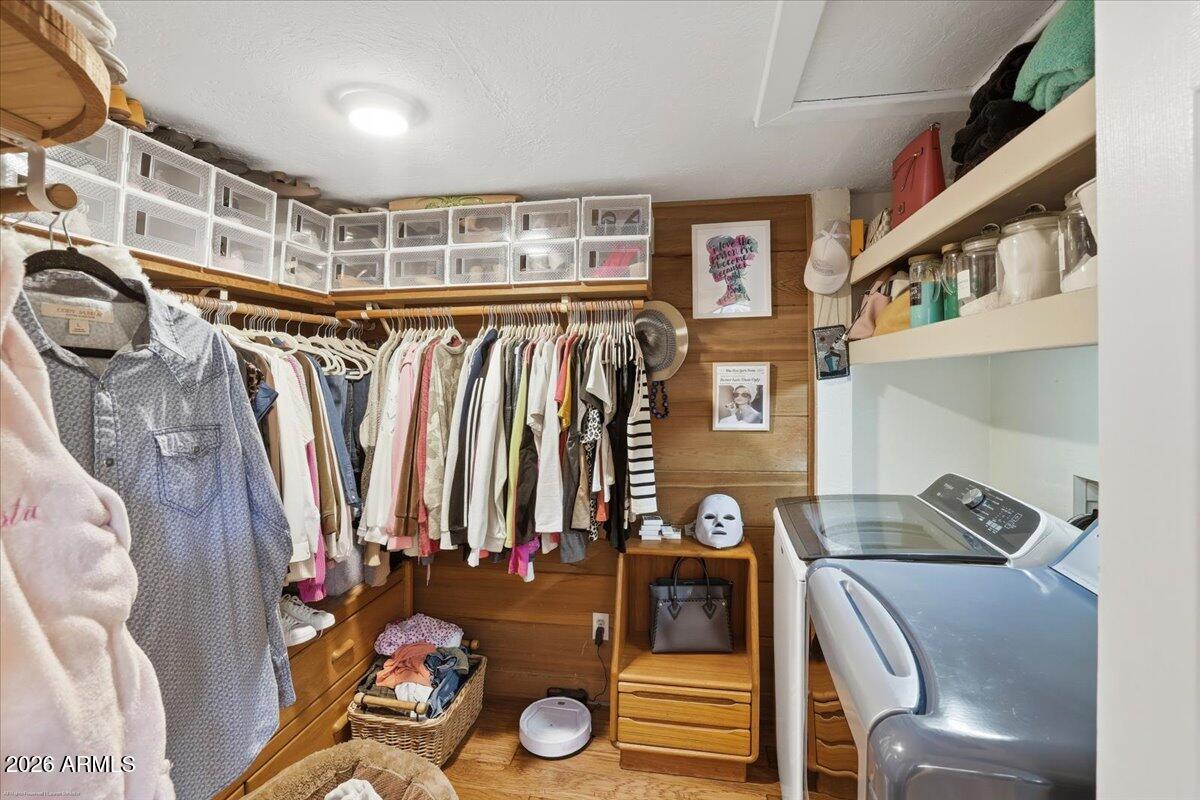 4426 North State Rte 89A, Unit 13 Sedona, AZ 86336 - Photo 19 of 47 a view of walk in closet with clothes and shoes
