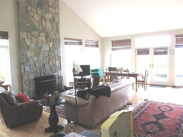 50 Colrain Stage Road Heath, MA 01346 - Photo 3 of 22 a living room with furniture and a fireplace