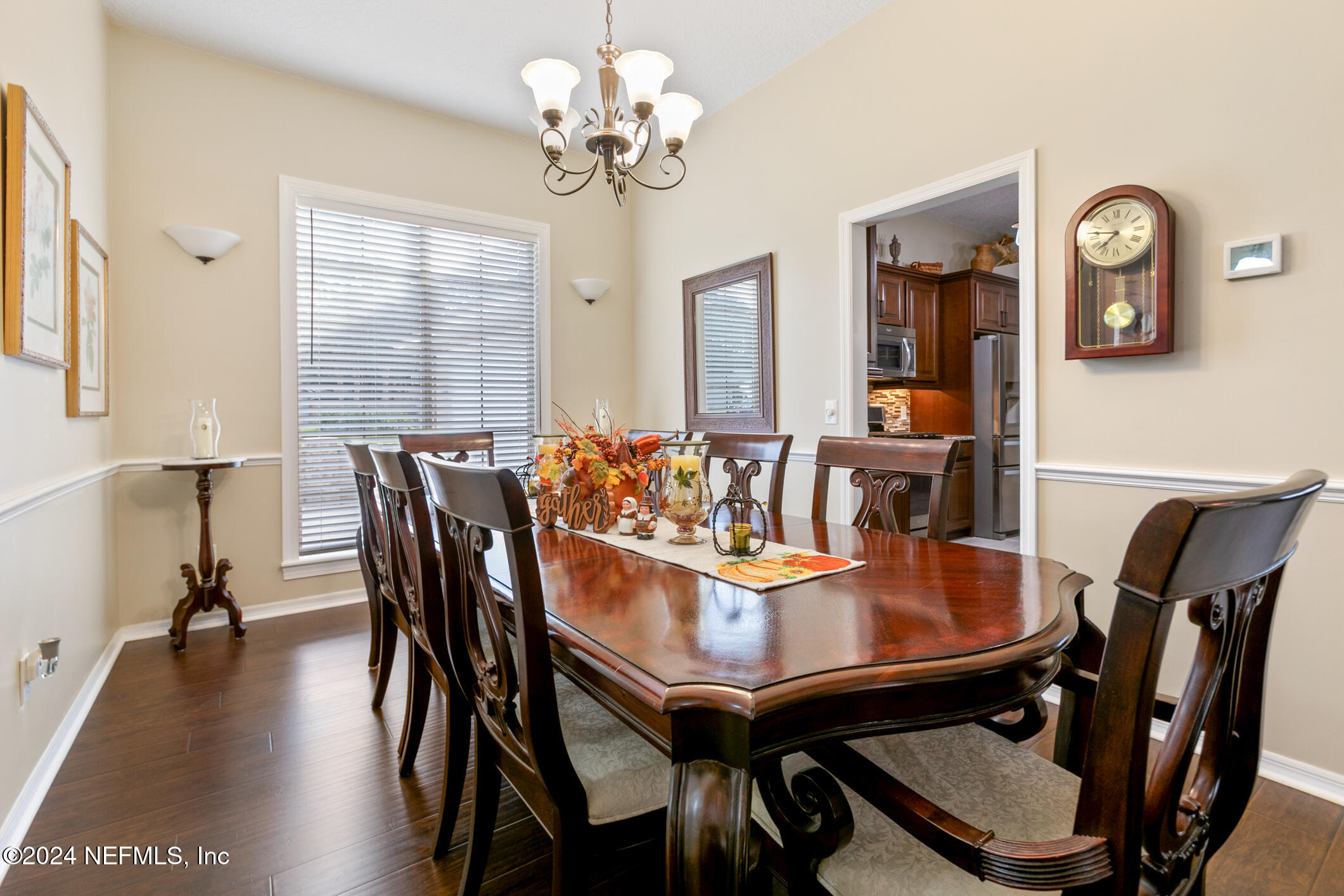 540 Moultrie Wells Road St. Augustine, FL 32086 - Photo 11 of 44 a view of a dining room with furniture window and wooden floor