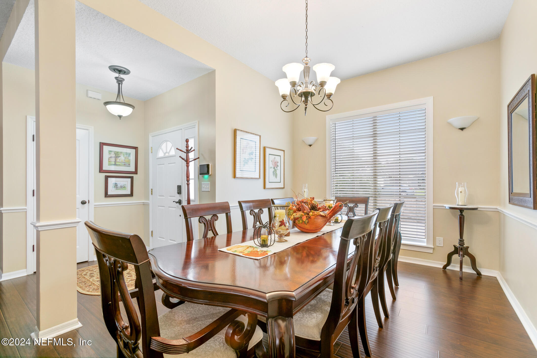 540 Moultrie Wells Road St. Augustine, FL 32086 - Photo 12 of 44 a view of a dining room with furniture window and wooden floor