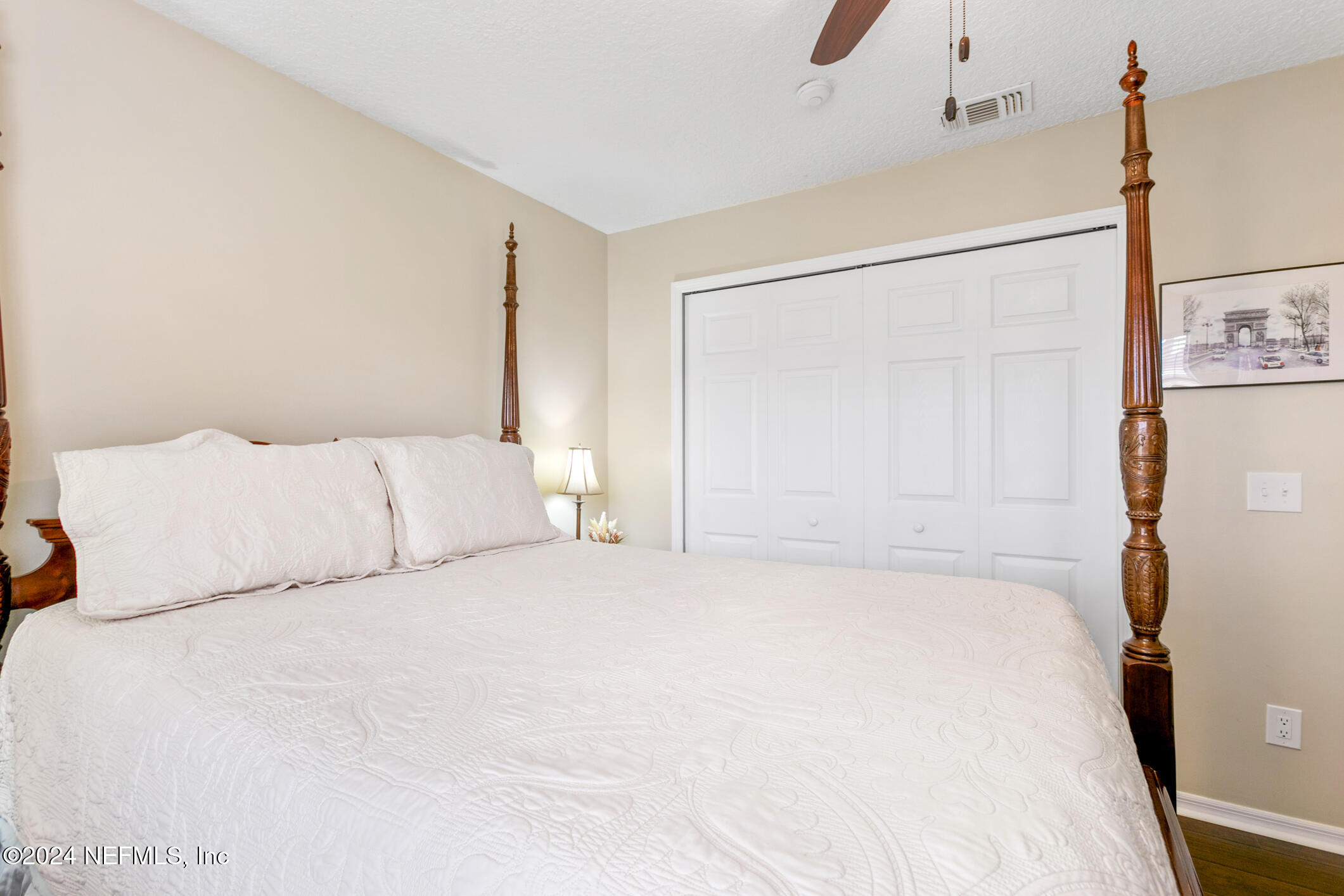 540 Moultrie Wells Road St. Augustine, FL 32086 - Photo 14 of 44 a large white bed in a white room