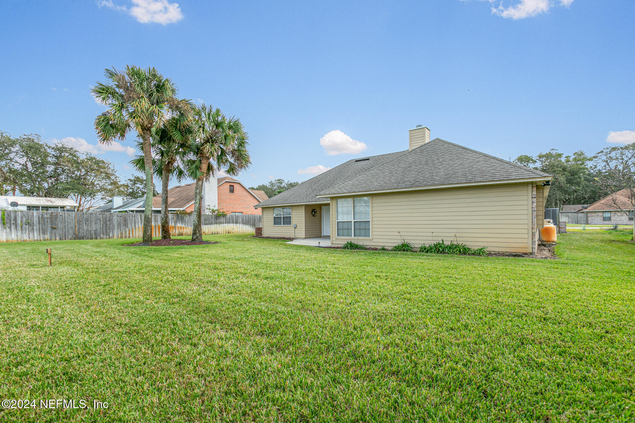 540 Moultrie Wells Road St. Augustine, FL 32086 - Photo 39 of 44 a front view of a house with garden