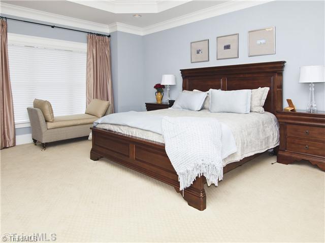 815 Heron Ridge Road Winston-Salem, NC 27106 - Photo 11 of 16 Master Bedroom. With trey ceiling, his & her walk-in closets & adjoining spa bath.