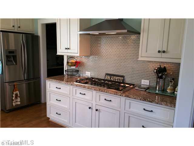 815 Heron Ridge Road Winston-Salem, NC 27106 - Photo 6 of 16 Kitchen. With SS vented hood.