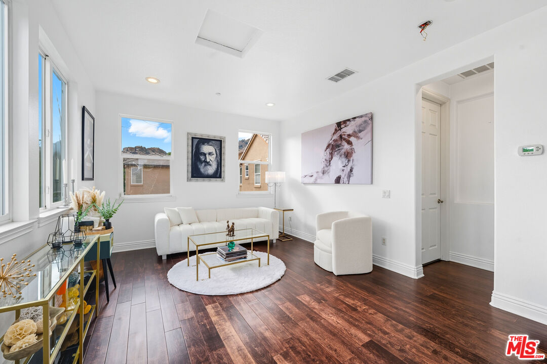 22074 Sagebrook Road Chatsworth, CA 91311 - Photo 12 of 35 a living room with furniture and a wooden floor