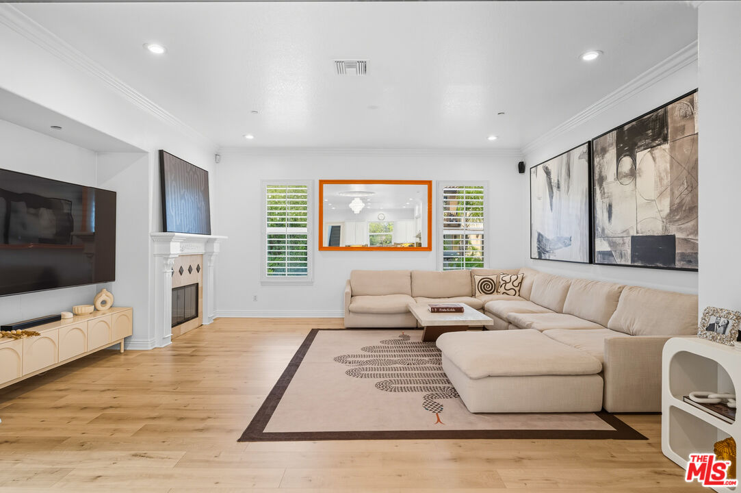 22074 Sagebrook Road Chatsworth, CA 91311 - Photo 17 of 35 a living room with furniture window and flat screen tv