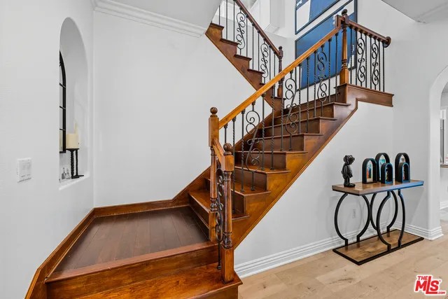a view of entryway with wooden floor