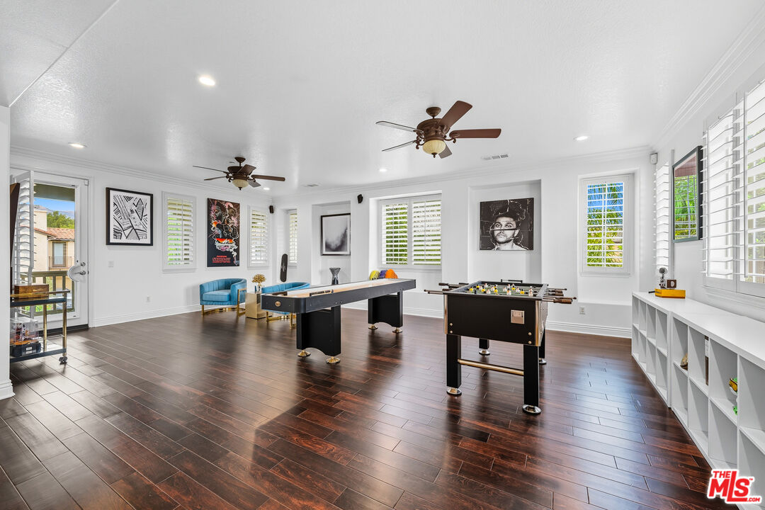 22074 Sagebrook Road Chatsworth, CA 91311 - Photo 23 of 35 a living room with furniture and wooden floor