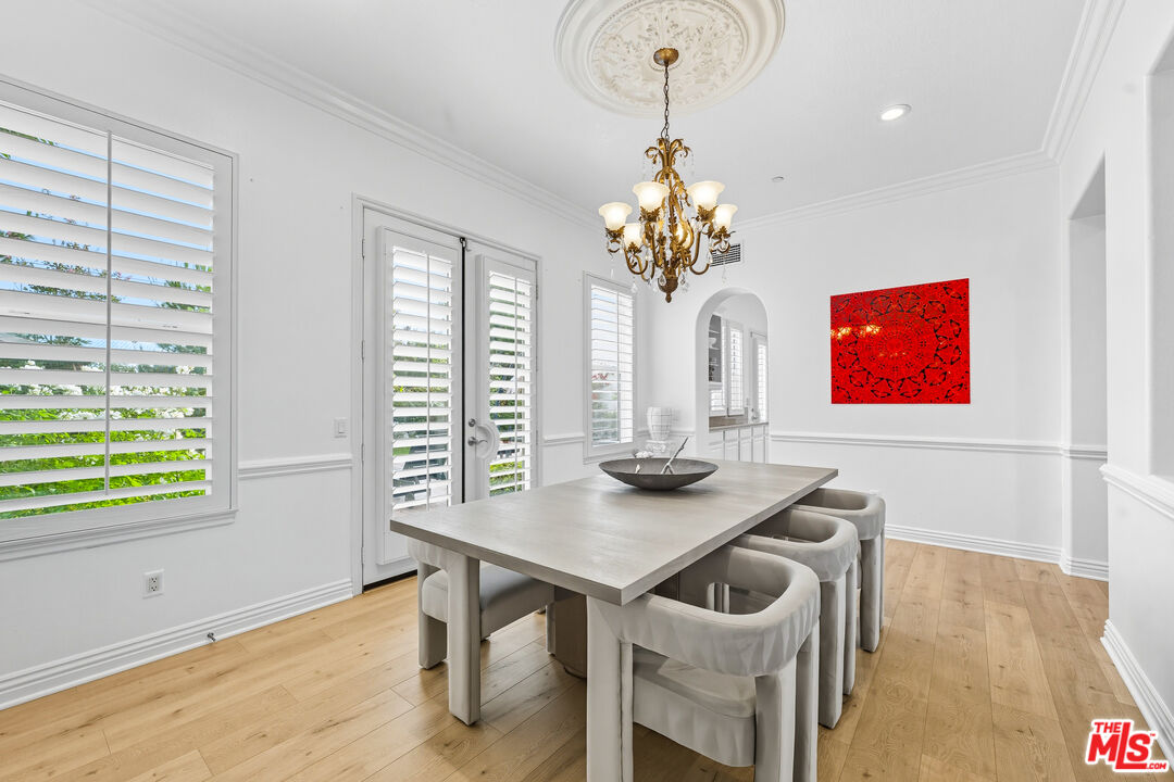 22074 Sagebrook Road Chatsworth, CA 91311 - Photo 5 of 35 a view of a dining room with furniture and chandelier
