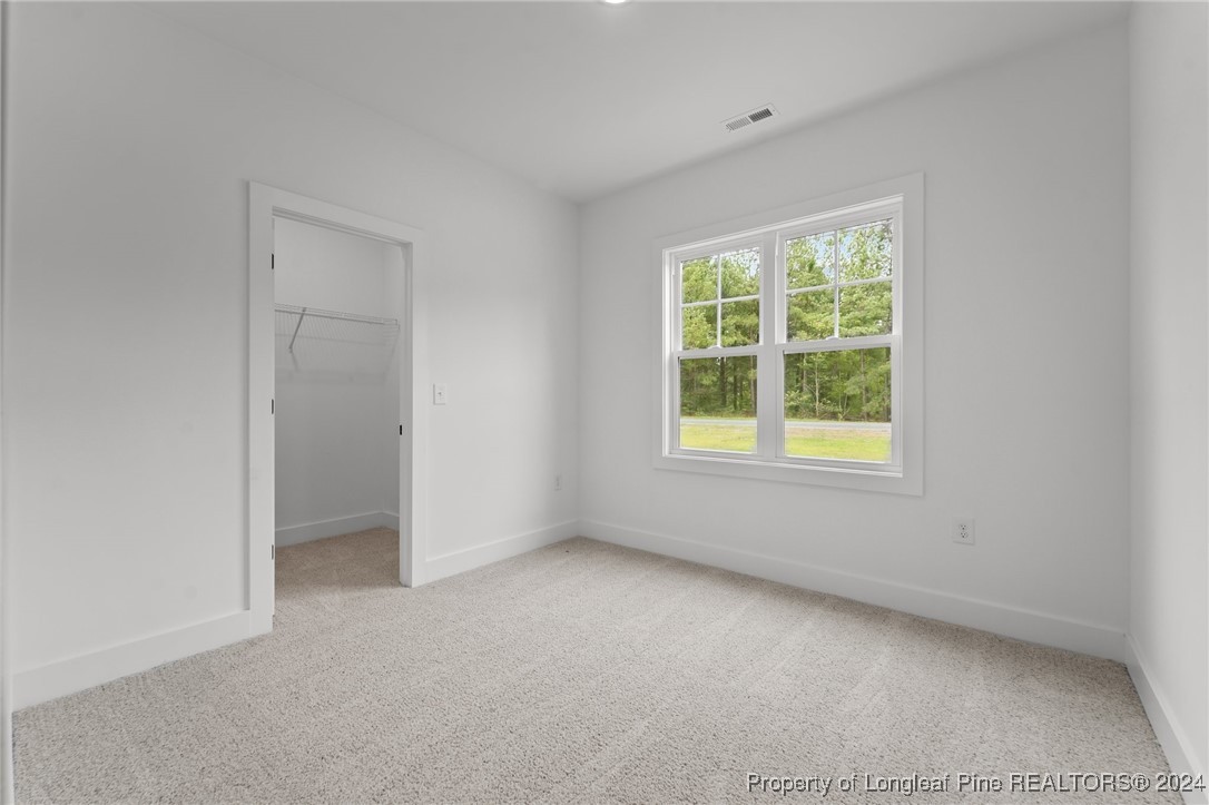 2902 Calloway (lot 1) Road Raeford, NC 28376 - Photo 33 of 44 an empty room with a window