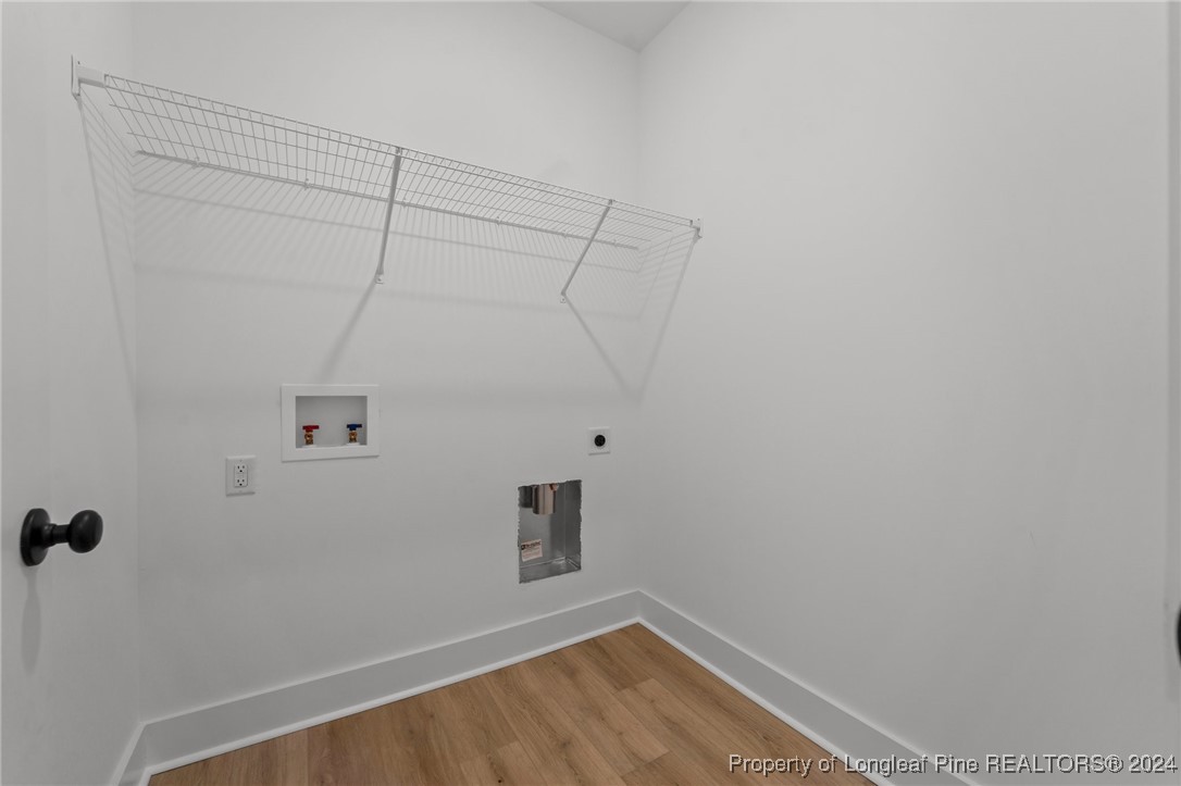 2902 Calloway (lot 1) Road Raeford, NC 28376 - Photo 39 of 44 a view of a room with racks on the wall