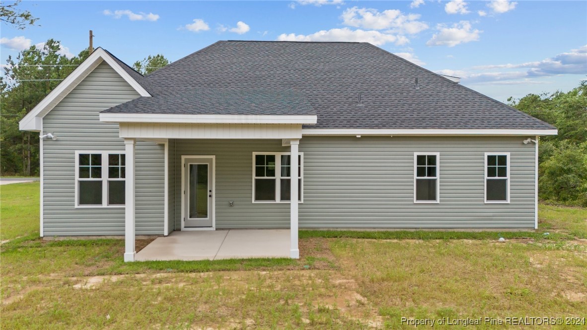 2902 Calloway (lot 1) Road Raeford, NC 28376 - Photo 4 of 44 a view of a house with a yard
