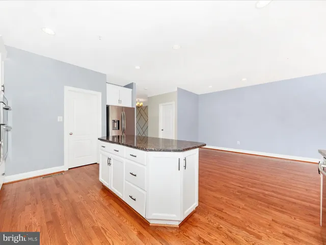 a view of a hallway with staircase