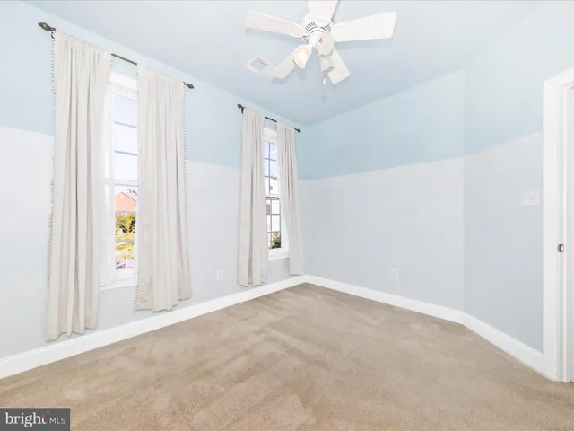 a view of a yard with table and chairs