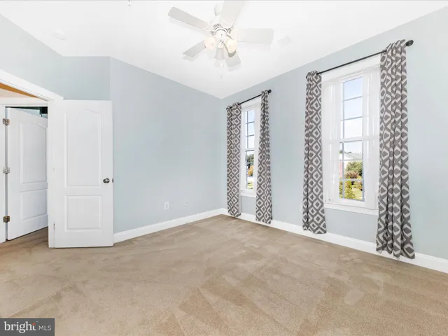 a view of a house with a large window