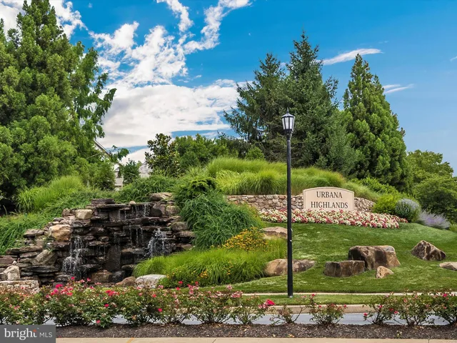 a view of an empty swimming pool and an outdoor space