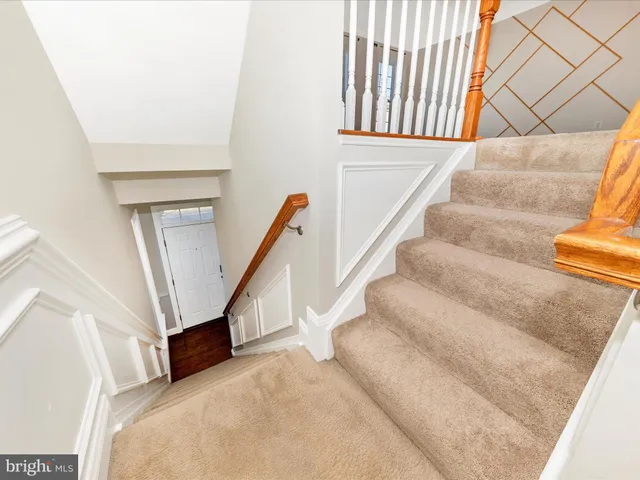 an empty room with a ceiling fan