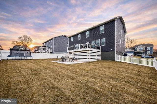 an aerial view of a house with outdoor space
